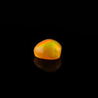 Ethiopian Opal - 1.65ct Rolling Flash Caramel Color Background