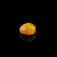 Ethiopian Opal - 1.65ct Rolling Flash Caramel Color Background