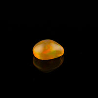 Ethiopian Opal - 1.65ct Rolling Flash Caramel Color Background