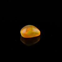 Ethiopian Opal - 1.65ct Rolling Flash Caramel Color Background