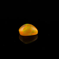 Ethiopian Opal - 1.65ct Rolling Flash Caramel Color Background