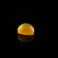 Ethiopian Opal - 1.65ct Rolling Flash Caramel Color Background