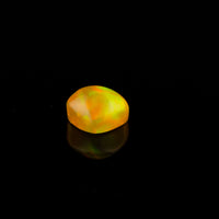 Ethiopian Opal - 1.65ct Rolling Flash Caramel Color Background