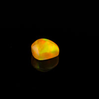 Ethiopian Opal - 1.65ct Rolling Flash Caramel Color Background
