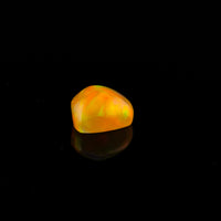 Ethiopian Opal - 1.65ct Rolling Flash Caramel Color Background