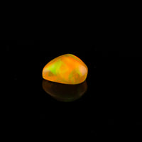 Ethiopian Opal - 1.65ct Rolling Flash Caramel Color Background