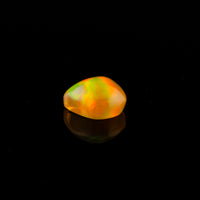 Ethiopian Opal - 1.65ct Rolling Flash Caramel Color Background