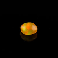 Ethiopian Opal - 1.65ct Rolling Flash Caramel Color Background