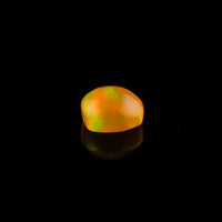 Ethiopian Opal - 1.65ct Rolling Flash Caramel Color Background