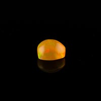 Ethiopian Opal - 1.65ct Rolling Flash Caramel Color Background