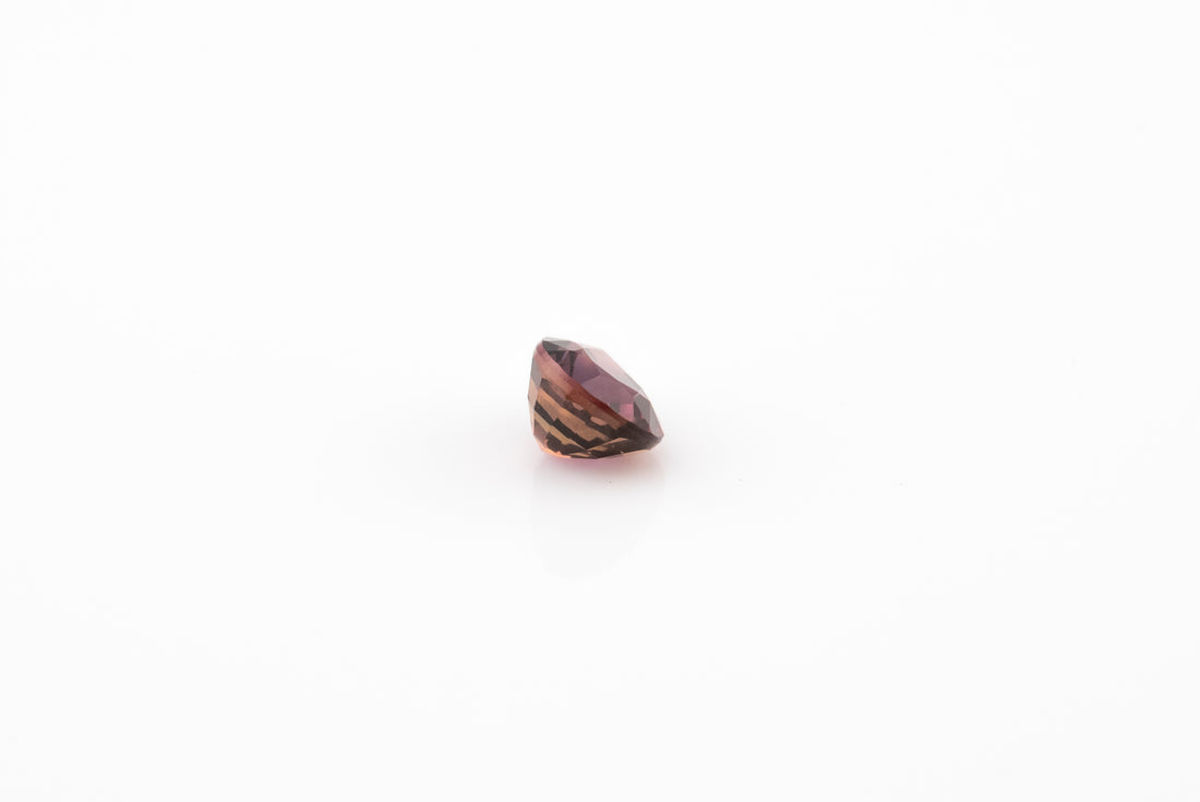 Sapphire - 0.61ct Pear Pinkish Purple Unheated